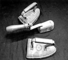 Artifacts in CHSNE’s archives collection include hand irons used in early Chinese laundries such as those pictured here. (CHSNE collection)